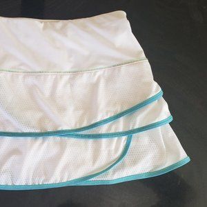 Luck in love Kids Tennis Skirt. Brand New, Size 14. White with neon piping